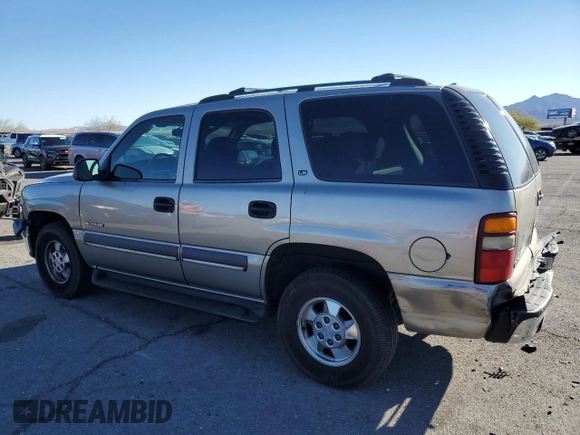 2002 Chevrolet Tahoe LS with VIN 1GNEC13V82R153063, listed as a Copart auction lot 84180594 with 148,190 mi miles and Salvage Title. Bid and sale history available at carsss.com. Image 2.