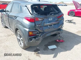 2021 Hyundai Kona Ultimate with VIN KM8K53A50MU601084, listed as a IAAI auction lot 41900099 with 56,171 mi miles. Bid and sale history available at carsss.com. Image 6.