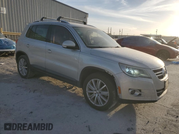 2011 Volkswagen Tiguan SEL w/Premium Navi with VIN WVGAV7AX8BW542758, listed as a Copart auction lot 49356485 with 77,958 mi miles and Salvage Title. Bid and sale history available at DreamBid. Image 4.