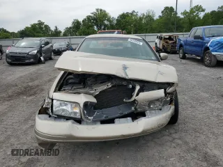 1999 Ford Crown Victoria LX с VIN 2FAFP74W7XX231833, выставлен на аукционе Copart как лот 58340925 с пробегом 156 032 миль миль и Списание • Salvage title. История ставок и продаж доступна на DreamBid. Изображение 5.