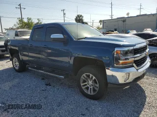2017 Chevrolet Silverado 1500 LT with VIN 1GCVKREH2HZ101731, listed as a Copart auction lot 52862905 with 160,184 mi miles and Salvage Title. Bid and sale history available at DreamBid. Image 4.