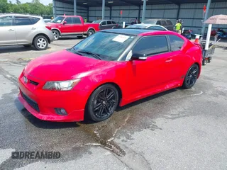 2013 Scion tC z VIN JTKJF5C75D3050222, wystawiony jako IAAI lot #42283520 z przebiegiem 95 129 mil mil oraz . Historia ofert i sprzedaży dostępna na DreamBid. Obrazek 2.