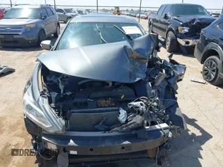 2017 Nissan Altima SV with VIN 1N4AL3AP1HC297434, listed as a IAAI auction lot 41992431 with 59,961 mi miles and . Bid and sale history available at DreamBid. Image 13.