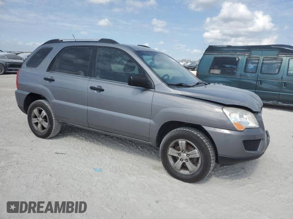 2009 Kia Sportage LX with VIN KNDJF724597601906, listed as a Copart auction lot 45317365 with 196,474 mi miles and Salvage Title. Bid and sale history available at carsss.com. Image 4.