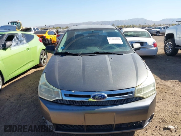 2009 Ford Focus SE z VIN 1FAHP35N79W166875, wystawiony jako IAAI lot #41506700 z przebiegiem 174 061 mil mil oraz . Historia ofert i sprzedaży dostępna na DreamBid. Obrazek 6.