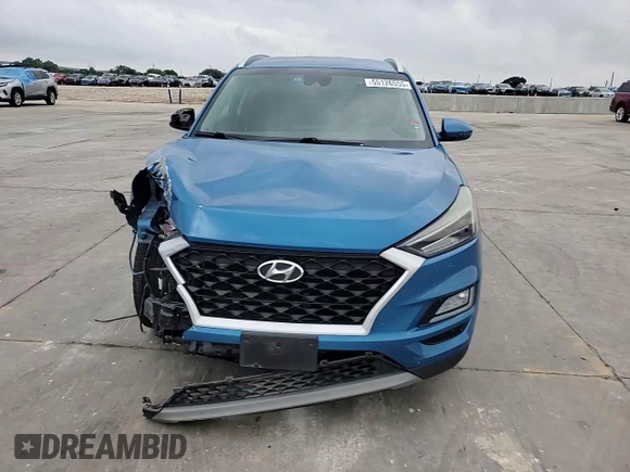 2019 Hyundai Tucson Sport z VIN KM8J33AL5KU861199, wystawiony jako Copart lot #55126555 z przebiegiem 75 432 mil mil oraz Szkoda całkowita • Salvage title. Historia ofert i sprzedaży dostępna na DreamBid. Obrazek 14.