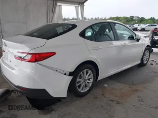 2025 Toyota Camry LE with VIN 4T1DAACK9SU112515, listed as a IAAI auction lot 41932562 with 587 mi miles and . Bid and sale history available at DreamBid. Image 4.