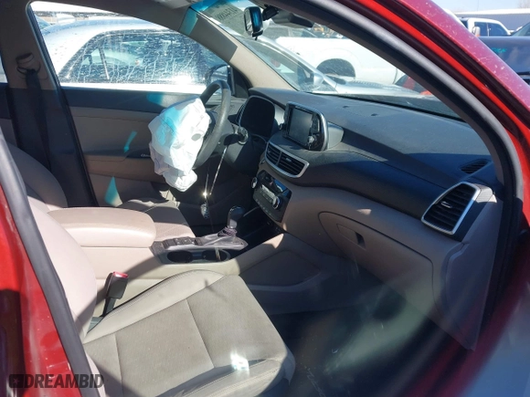 2019 Hyundai Tucson Value with VIN KM8J33A40KU077246, listed as a IAAI auction lot 41344888 with 72,259 mi miles. Bid and sale history available at carsss.com. Image 5.