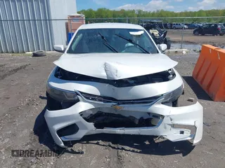 2018 Chevrolet Malibu LT z VIN 1G1ZD5ST7JF113869, wystawiony jako IAAI lot #42188467 z przebiegiem 104 531 mil mil oraz . Historia ofert i sprzedaży dostępna na DreamBid. Obrazek 12.