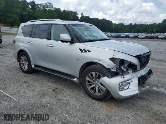 2016 Infiniti QX80 with VIN JN8AZ2NF5G9610490, listed as a Copart auction lot 60041325 with 131,253 mi miles and Salvage title. Bid and sale history available at DreamBid. Image 4.