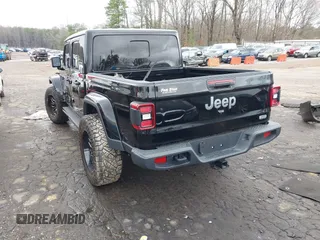 2022 Jeep Gladiator High Altitude z VIN 1C6HJTFG1NL164764, wystawiony jako IAAI lot #41727357 z przebiegiem 28 222 mil mil oraz . Historia ofert i sprzedaży dostępna na DreamBid. Obrazek 3.