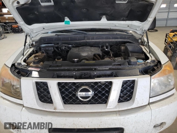 2010 Nissan Titan Pro-4X with VIN 1N6BA0EC3AN312601, listed as a Copart auction lot 52633455 with 161,260 mi miles and Salvage title. Bid and sale history available at DreamBid. Image 11.