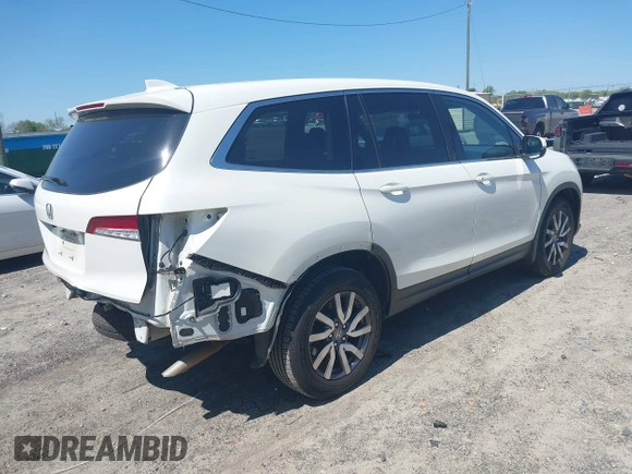 2019 Honda Pilot EX-L with VIN 5FNYF5H57KB038019, listed as a IAAI auction lot 41994410 with 126,738 mi miles and . Bid and sale history available at carsss.com. Image 4.