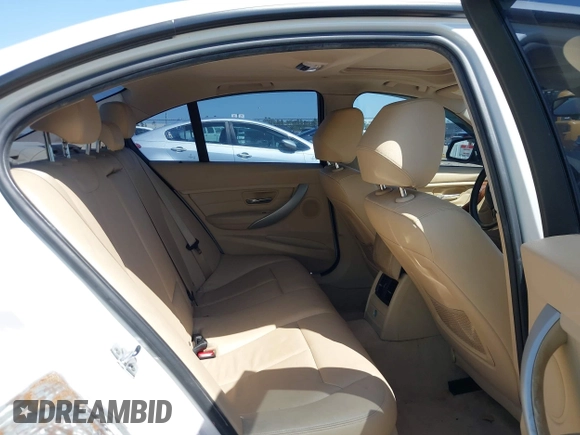 2012 BMW 3 Series 328i with VIN WBA3A5C51CF349987, listed as a IAAI auction lot 42013599 with 256,461 mi miles. Bid and sale history available at carsss.com. Image 8.