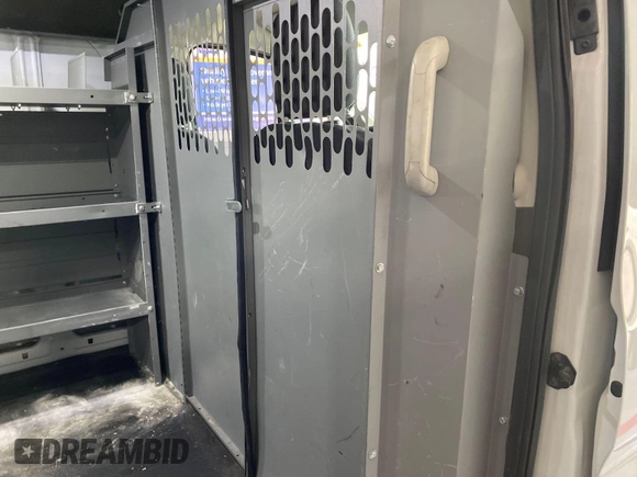 2020 Ford Transit Cargo with VIN 1FTBR1Y88LKB08471, listed as a IAAI auction lot 42297878 with 100,218 mi miles and . Bid and sale history available at DreamBid. Image 12.