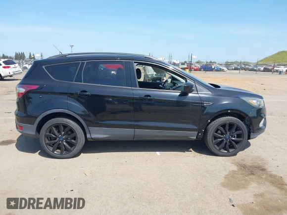 2017 Ford Escape SE with VIN 1FMCU0G9XHUE37185, listed as a IAAI auction lot 42053979 with 72,904 mi miles. Bid and sale history available at carsss.com. Image 13.