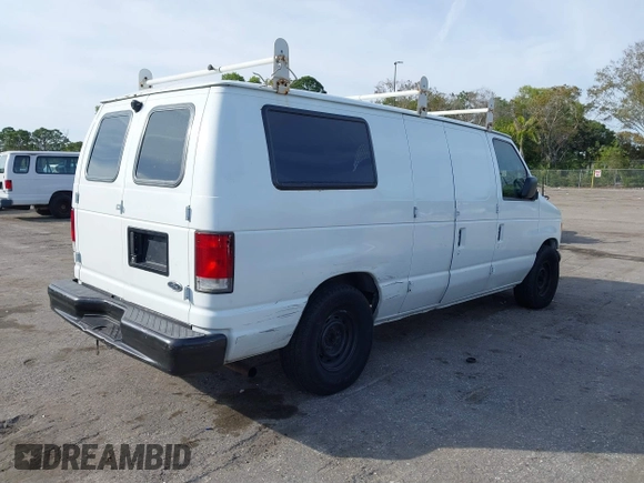 2001 Ford Econoline Cargo with VIN 1FTRE14291HA84414, listed as a IAAI auction lot 41463623 with 192,835 mi miles. Bid and sale history available at carsss.com. Image 4.
