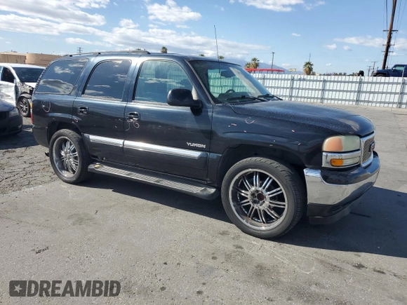 2004 GMC Yukon SLE with VIN 1GKEC13V44R263849, listed as a Copart auction lot 47528325 with 448,294 mi miles and Salvage Title. Bid and sale history available at carsss.com. Image 4.