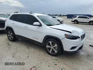 2020 Jeep Cherokee Limited with VIN 1C4PJLDXXLD615012, listed as a Copart auction lot 63091404 with 58,004 mi miles and Salvage title. Bid and sale history available at DreamBid. Image 4.