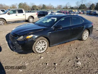 2019 Toyota Camry Hybrid LE z VIN 4T1B21HK8KU009907, wystawiony jako Copart lot #88233485 z przebiegiem 138 254 mil mil oraz Szkoda całkowita • Salvage title. Historia ofert i sprzedaży dostępna na DreamBid. Obrazek 1.