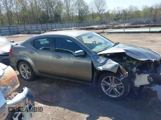 2013 Dodge Avenger SXT with VIN 1C3CDZCG7DN585431, listed as a IAAI auction lot 41975228 with 152,703 mi miles and . Bid and sale history available at carsss.com. Image 13.