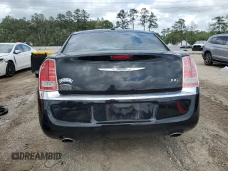 2012 Chrysler 300 Limited z VIN 2C3CCACG6CH144305, wystawiony jako Copart lot #51346195 z przebiegiem 133 872 mil mil oraz Szkoda całkowita • Salvage title. Historia ofert i sprzedaży dostępna na DreamBid. Obrazek 6.