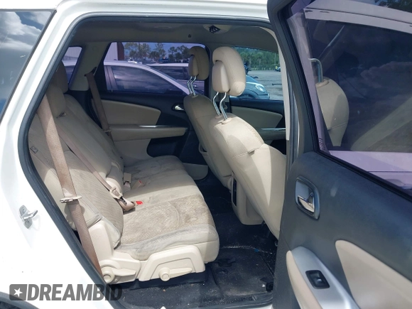 2013 Dodge Journey Canada Value z VIN 3C4PDCAB1DT646810, wystawiony jako IAAI lot #42484918 z przebiegiem 212 456 mil mil oraz . Historia ofert i sprzedaży dostępna na DreamBid. Obrazek 8.