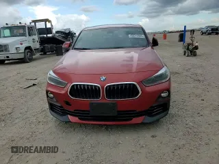 2018 BMW X2 sDrive28i with VIN WBXYJ3C37JEJ75893, listed as a Copart auction lot 62513565 with 62,029 mi miles and Salvage title. Bid and sale history available at DreamBid. Image 13.