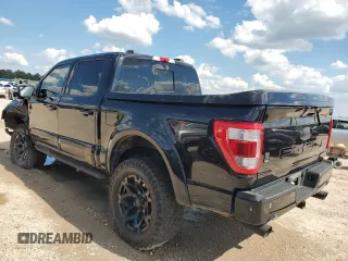 2021 Ford F-150 XL with VIN 1FTFW1E5XMFB70288, listed as a Copart auction lot 52735033 with 35,111 mi miles and Salvage Title. Bid and sale history available at carsss.com. Image 2.