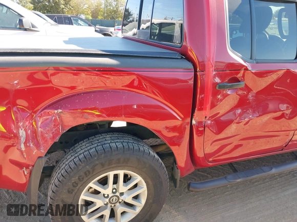 2016 Nissan Frontier S with VIN 1N6AD0ER9GN745596, listed as a IAAI auction lot 40860927 with 136,457 mi miles and . Bid and sale history available at DreamBid. Image 6.
