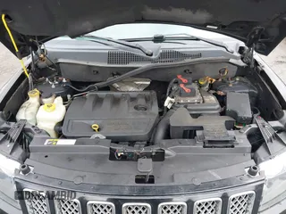 2016 Jeep Compass High Altitude Edition with VIN 1C4NJDEB4GD695249, listed as a IAAI auction lot 42030142 with 155,849 mi miles. Bid and sale history available at carsss.com. Image 10.