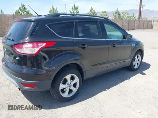 2013 Ford Escape SE z VIN 1FMCU9GX4DUC94117, wystawiony jako IAAI lot #42394333 z przebiegiem 261 392 mil mil oraz . Historia ofert i sprzedaży dostępna na DreamBid. Obrazek 4.