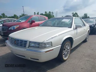 2001 Cadillac Eldorado ESC with VIN 1G6EL12Y01B104230, listed as a IAAI auction lot 42521397 with 60,570 mi miles and . Bid and sale history available at DreamBid. Image 2.