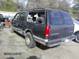 1993 GMC Suburban with VIN 1GKEC16K9PJ754213, listed as a IAAI auction lot 22062516 with 212,780 mi miles. Bid and sale history available at carsss.com. Image 3.