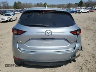 2021 Mazda CX-5 Grand Touring with VIN JM3KFADM6M0387094, listed as a Copart auction lot 48350845 with 94,701 mi miles and Salvage Title. Bid and sale history available at carsss.com. Image 6.