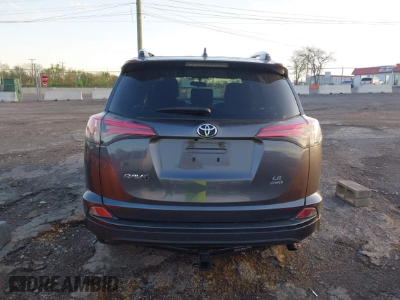 2016 Toyota RAV4 LE with VIN JTMBFREV1GD187414, listed as a IAAI auction lot 42033130 with 123,955 mi miles and . Bid and sale history available at carsss.com. Image 16.