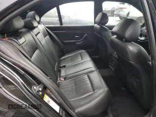 2000 BMW M5 z VIN WBSDE9345YBZ94319, wystawiony jako Copart lot #49945325 z przebiegiem 146 571 mil mil oraz Czysty tytuł • Clean title. Historia ofert i sprzedaży dostępna na DreamBid. Obrazek 10.