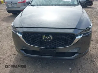 2024 Mazda CX-5 S Premium z VIN JM3KFBDLXR0486618, wystawiony jako IAAI lot #42055952 z przebiegiem 4559 mil mil oraz . Historia ofert i sprzedaży dostępna na DreamBid. Obrazek 12.