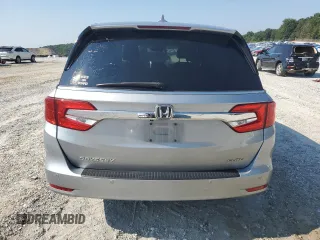 2018 Honda Odyssey Elite with VIN 5FNRL6H95JB062033, listed as a Copart auction lot 63732915 with 105,234 mi miles and Salvage title. Bid and sale history available at DreamBid. Image 6.