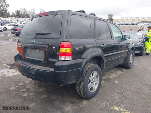 2005 Ford Escape Limited with VIN 1FMYU04155KC05430, listed as a IAAI auction lot 41784958 with 190,822 mi miles. Bid and sale history available at carsss.com. Image 4.