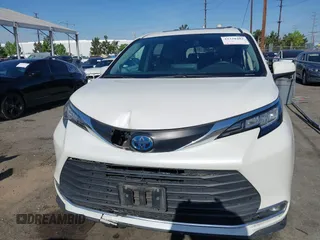 2021 Toyota Sienna XLE z VIN 5TDJRKEC7MS009306, wystawiony jako IAAI lot #42328482 z przebiegiem 169 443 mil mil oraz . Historia ofert i sprzedaży dostępna na DreamBid. Obrazek 12.