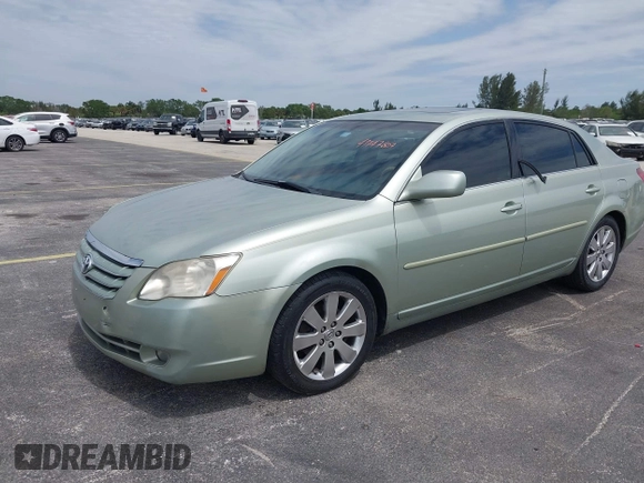2007 Toyota Avalon XL with VIN 4T1BK36B27U219456, listed as a IAAI auction lot 41747807 with 169,599 mi miles. Bid and sale history available at carsss.com. Image 2.