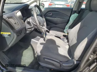 2013 Kia Rio EX with VIN KNADN4A30D6104166, listed as a Copart auction lot 56752345 with 129,708 mi miles and Salvage title. Bid and sale history available at DreamBid. Image 7.