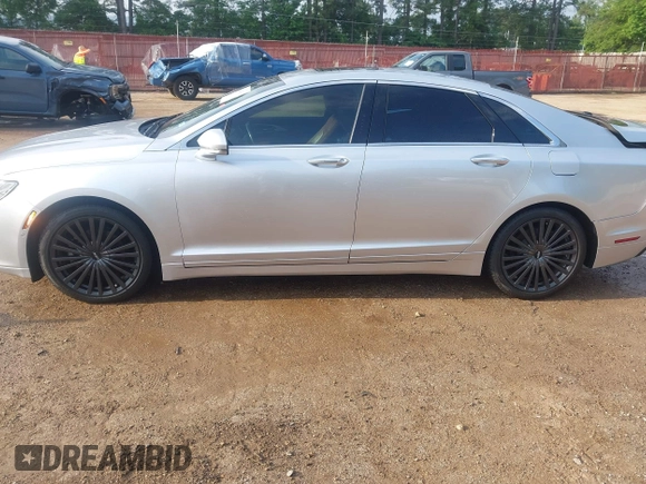 2017 Lincoln MKZ Reserve z VIN 3LN6L5E96HR649914, wystawiony jako IAAI lot #42136130 z przebiegiem 84 144 mil mil oraz . Historia ofert i sprzedaży dostępna na DreamBid. Obrazek 14.