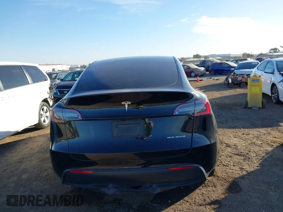2023 Tesla Model Y Long Range with VIN 7SAYGDEE0PF907260, listed as a IAAI auction lot 41180227 with Not Provided miles and . Bid and sale history available at DreamBid. Image 16.