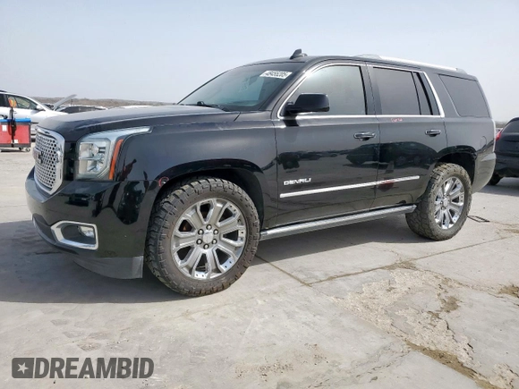 2015 GMC Yukon Denali with VIN 1GKS2CKJ2FR580533, listed as a Copart auction lot 48455205 with 147,532 mi miles and Salvage Title. Bid and sale history available at carsss.com. Image 1.