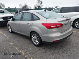 2015 Ford Focus SE with VIN 1FADP3F21FL376579, listed as a IAAI auction lot 41972088 with 129,593 mi miles. Bid and sale history available at carsss.com. Image 3.