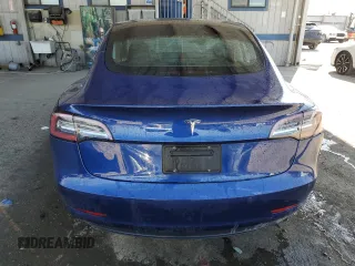 2020 Tesla Model 3 Standard Range Plus with VIN 5YJ3E1EA7LF705907, listed as a Copart auction lot 48765145 with 104,479 mi miles and Salvage Title. Bid and sale history available at DreamBid. Image 6.
