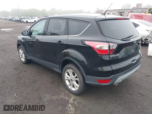 2017 Ford Escape SE with VIN 1FMCU9GD3HUD90154, listed as a IAAI auction lot 42181078 with 106,143 mi miles and . Bid and sale history available at DreamBid. Image 3.