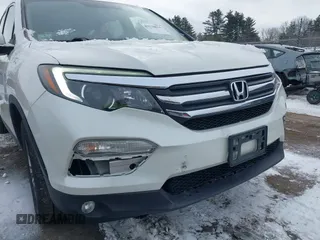2017 Honda Pilot EX-L with VIN 5FNYF6H52HB015651, listed as a IAAI auction lot 41538814 with 121,433 mi miles and . Bid and sale history available at DreamBid. Image 17.